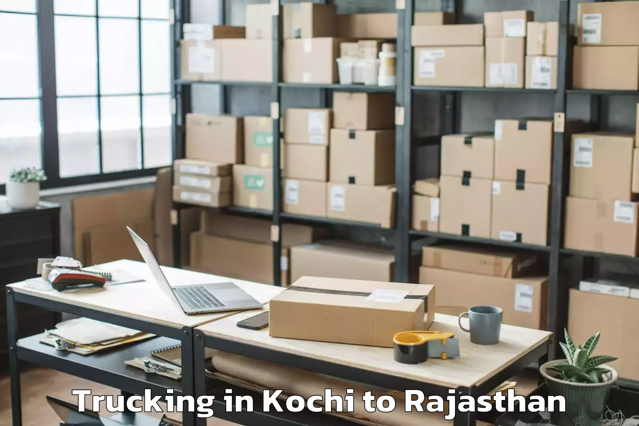 Book Kochi to Rajasthan University Of Health Trucking